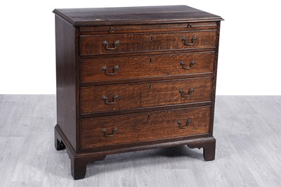 Lot 47 - A Georgian style oak bachelor’s chest of drawers