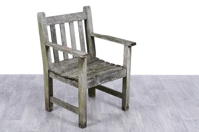Lot 412 - A teak garden armchair