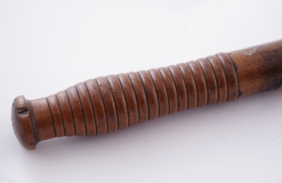Lot 94 - A Victorian painted truncheon, by Field of Holborn; and a pair of wrought iron handcuffs