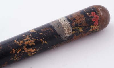 Lot 94 - A Victorian painted truncheon, by Field of Holborn; and a pair of wrought iron handcuffs