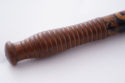 Lot 94 - A Victorian painted truncheon, by Field of Holborn; and a pair of wrought iron handcuffs
