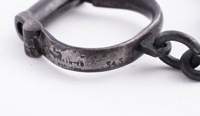 Lot 94 - A Victorian painted truncheon, by Field of Holborn; and a pair of wrought iron handcuffs