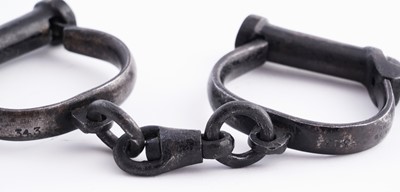 Lot 94 - A Victorian painted truncheon, by Field of Holborn; and a pair of wrought iron handcuffs
