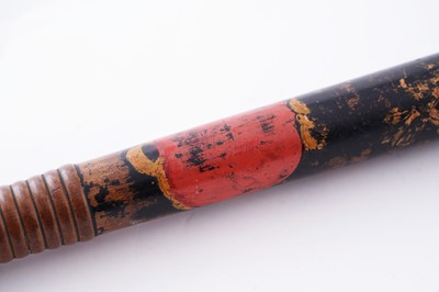 Lot 94 - A Victorian painted truncheon, by Field of Holborn; and a pair of wrought iron handcuffs