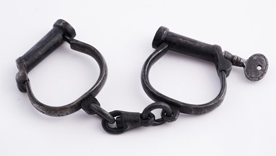 Lot 94 - A Victorian painted truncheon, by Field of Holborn; and a pair of wrought iron handcuffs