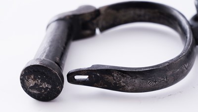 Lot 94 - A Victorian painted truncheon, by Field of Holborn; and a pair of wrought iron handcuffs