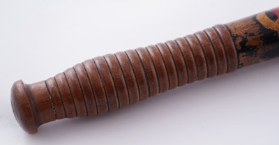 Lot 94 - A Victorian painted truncheon, by Field of Holborn; and a pair of wrought iron handcuffs