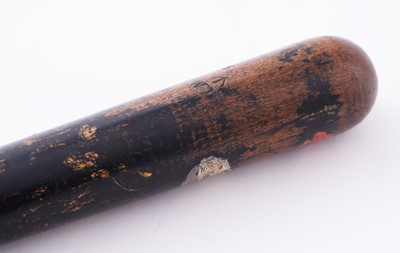 Lot 94 - A Victorian painted truncheon, by Field of Holborn; and a pair of wrought iron handcuffs