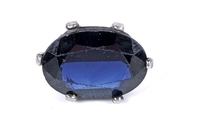 Lot 89 - An oval mixed-cut sapphire