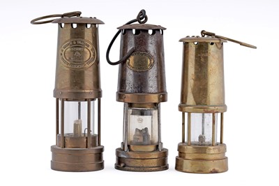 Lot 463 - A collection of three miner’s lamps