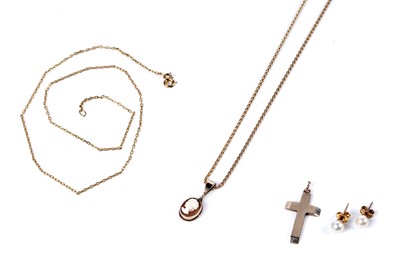 Lot 65 - An 18ct gold neck chain, with carved cameo pendant set in 9ct gold