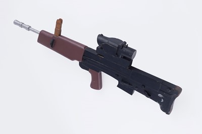 Lot 85 - A wooden and metal scale model of an SA80 machine gun used by Vickers