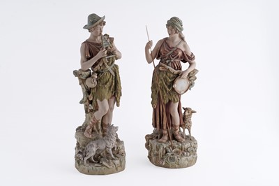 Lot 924 - A pair of Royal Dux figures of a shepherd and a shepherdess