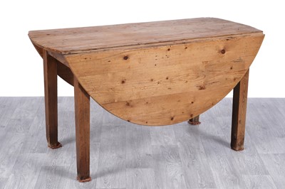 Lot 102 - A rustic pine drop leaf table