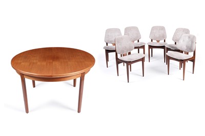 Lot 565 - Elliots of Newbury: a teak extending circular dining table; and six chairs