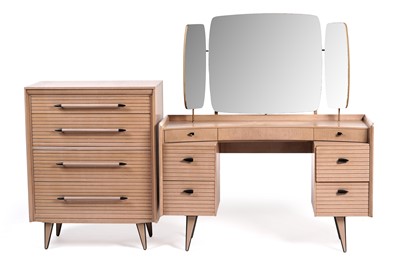 Lot 569 - Harris Lebus: a ‘Link’ limed oak dressing table; and chest of drawers