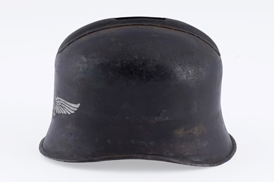 Lot 31 - A Luftwaffe helmet pattern money box