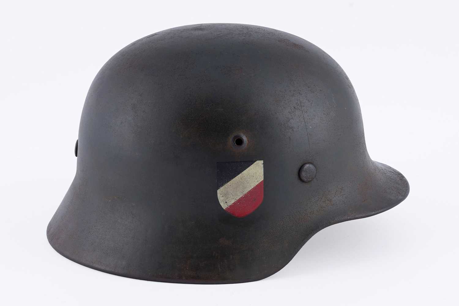Lot 35 - A German Second World War M35 helmet