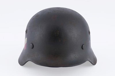 Lot 35 - A German Second World War M35 helmet