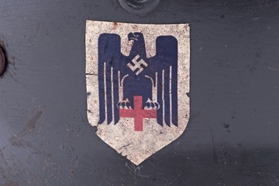 Lot 37 - Three German M40 helmets