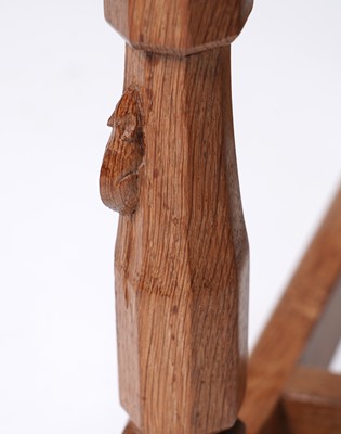 Lot 1073 - Robert ‘Mouseman’ Thompson: a set of four oak panel back dining chairs