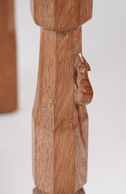 Lot 1073 - Robert ‘Mouseman’ Thompson: a set of four oak panel back dining chairs