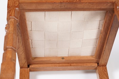 Lot 1073 - Robert ‘Mouseman’ Thompson: a set of four oak panel back dining chairs