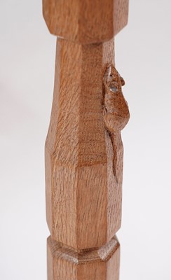 Lot 1073 - Robert ‘Mouseman’ Thompson: a set of four oak panel back dining chairs