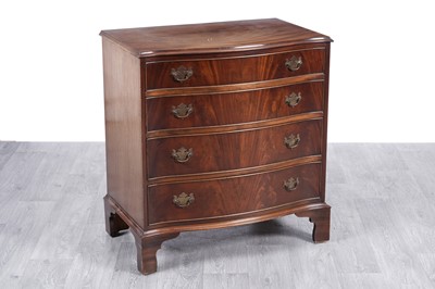 Lot 46 - A Georgian style serpentine-fronted mahogany chest of drawers
