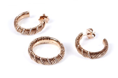 Lot 96 - A contemporary diamond and 18ct gold ring and earring set