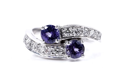 Lot 99 - A contemporary tanzanite and diamond ring on 18ct white gold