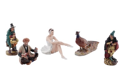 Lot 304 - A collection of four Royal Doulton figures; and a Royal Dux figure of a ballerina