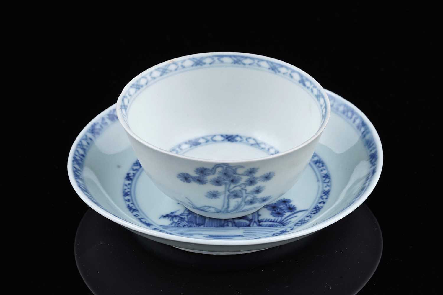 Lot 251 - A Nanking Cargo tea bowl and saucer