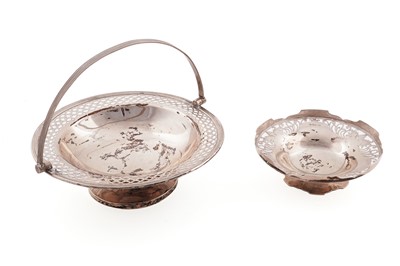 Lot 102 - A George V silver swing handled basket; and a silver bonbon dish