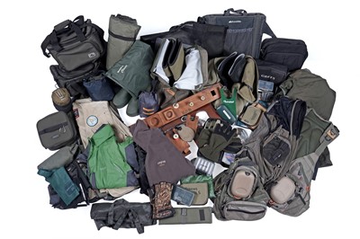 Lot 539 - A collection of fishing tackle boxes, waterproofs and other fishing accessories