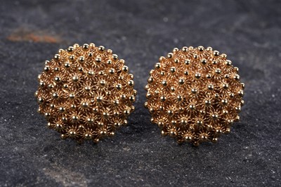 Lot 17 - A mid-20th Century pair of 18ct gold cannetille decorated stud earrings