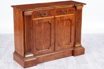 Lot 57 - An Regency style breakfront cabinet