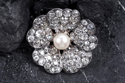 Lot 912 - A Victorian pearl and diamond flowerhead brooch