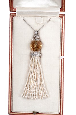 Lot 917 - An early 20th Century seed pearl, quartz and diamond pendant