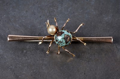 Lot 7 - A 1920's turquoise and faux pearl spider pattern bar brooch