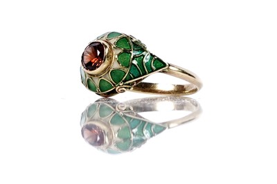 Lot 2 - An Edwardian Art Deco Egyptianate citrine and cloisonné enamelled ring