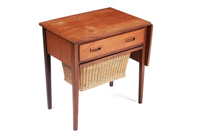 Lot 559 - A teak sewing table