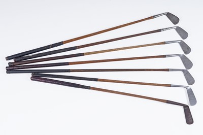 Lot 527 - Seven vintage hickory shafted gold clubs