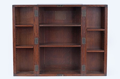 Lot 204 - A 19th Century oak campaign bookcase