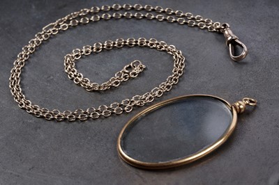 Lot 60 - A 9ct rose gold guard chain; and a locket