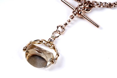 Lot 38 - An early 20th Century 9ct rose gold double "Albert" watch chain, with citrine fob seal