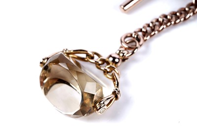 Lot 38 - An early 20th Century 9ct rose gold double "Albert" watch chain, with citrine fob seal
