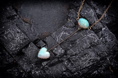 Lot 928 - An Edwardian opal pendant