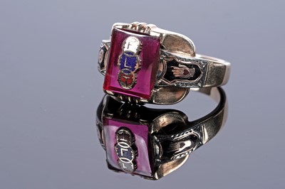 Lot 45 - A gentleman's ruby and 10ct gold Odd Fellows ring with champlevé enamelled decoration