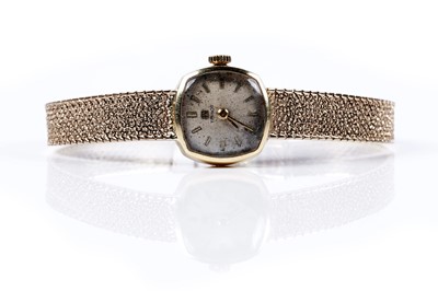 Lot 165 - A lady's Tissot 9ct gold cocktail watch